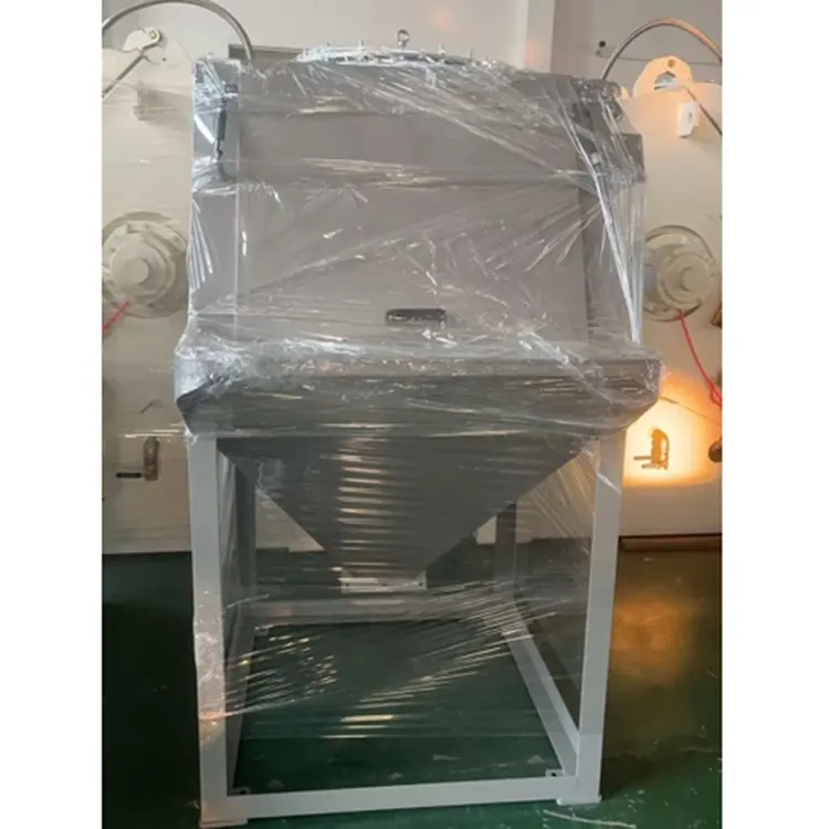 Estación de descarga de material auxiliar en polvo